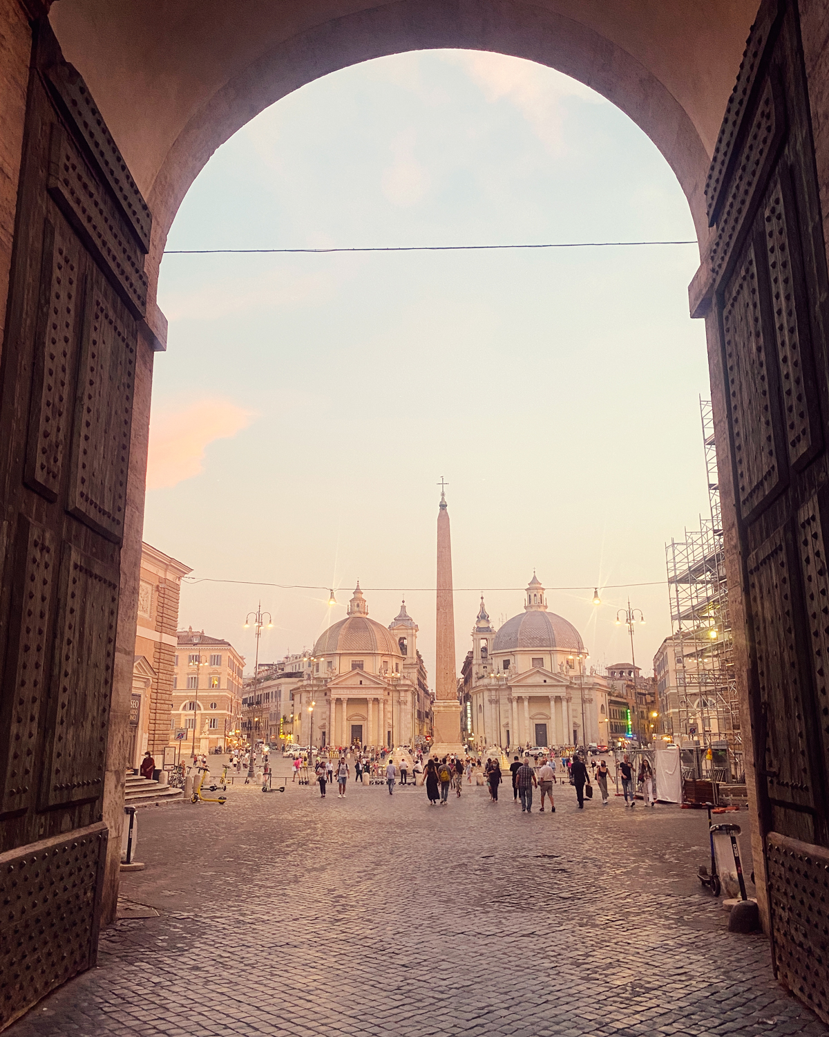 A Frame within the frame wide angle photo composition presenting Porta del Popolo and Twin Churches